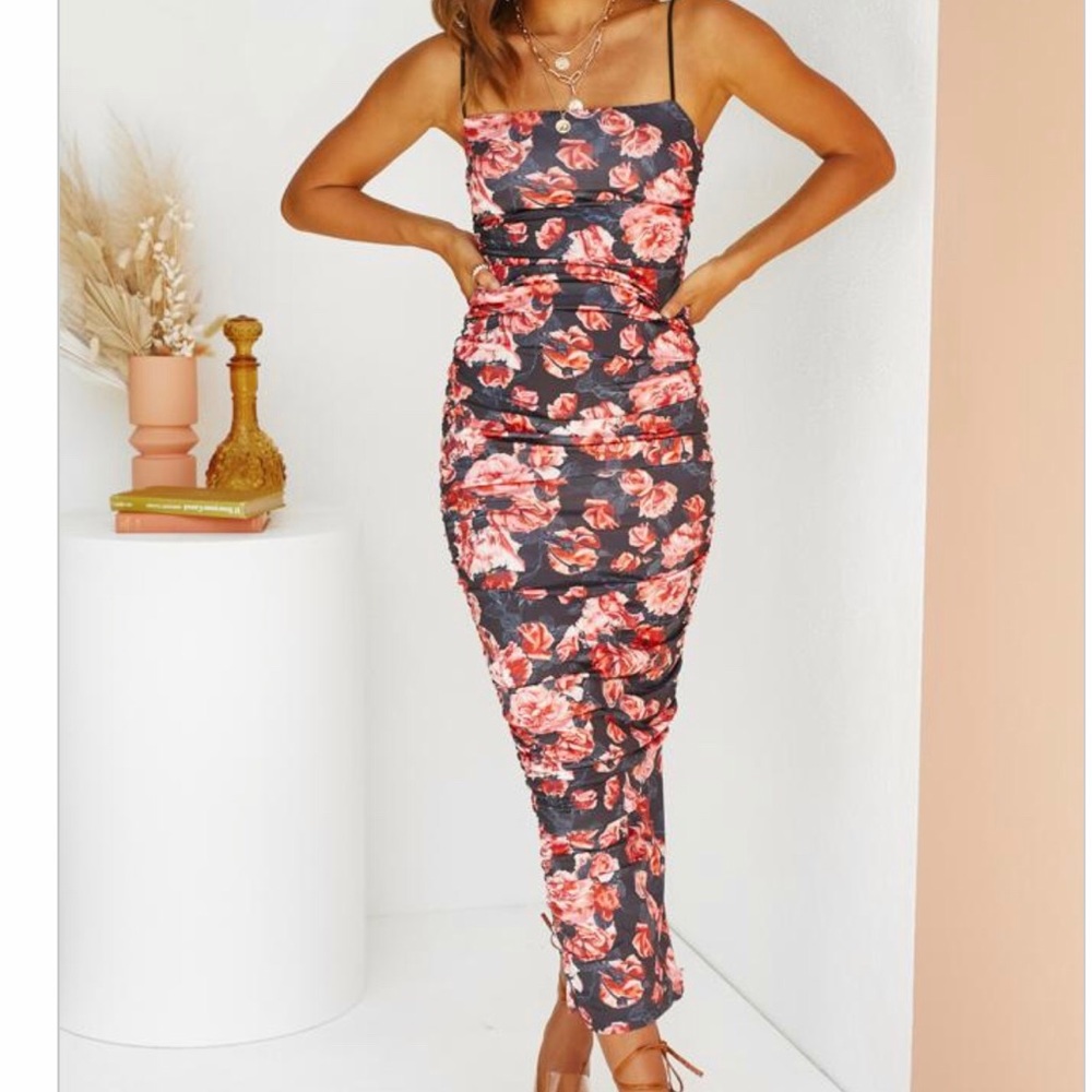 Skin tight beautiful floral cocktail dress.